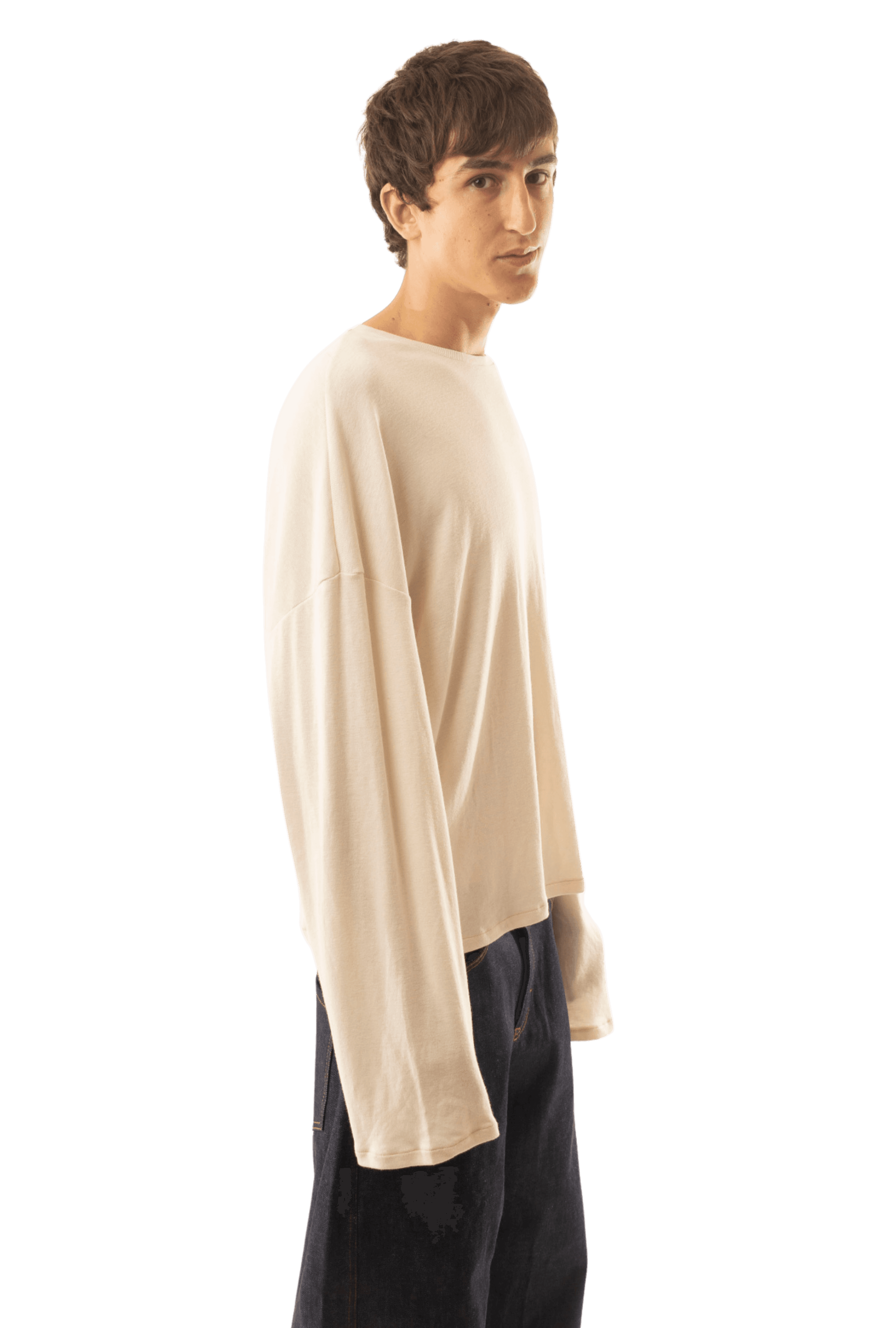 Model wearing cream long sleeve top